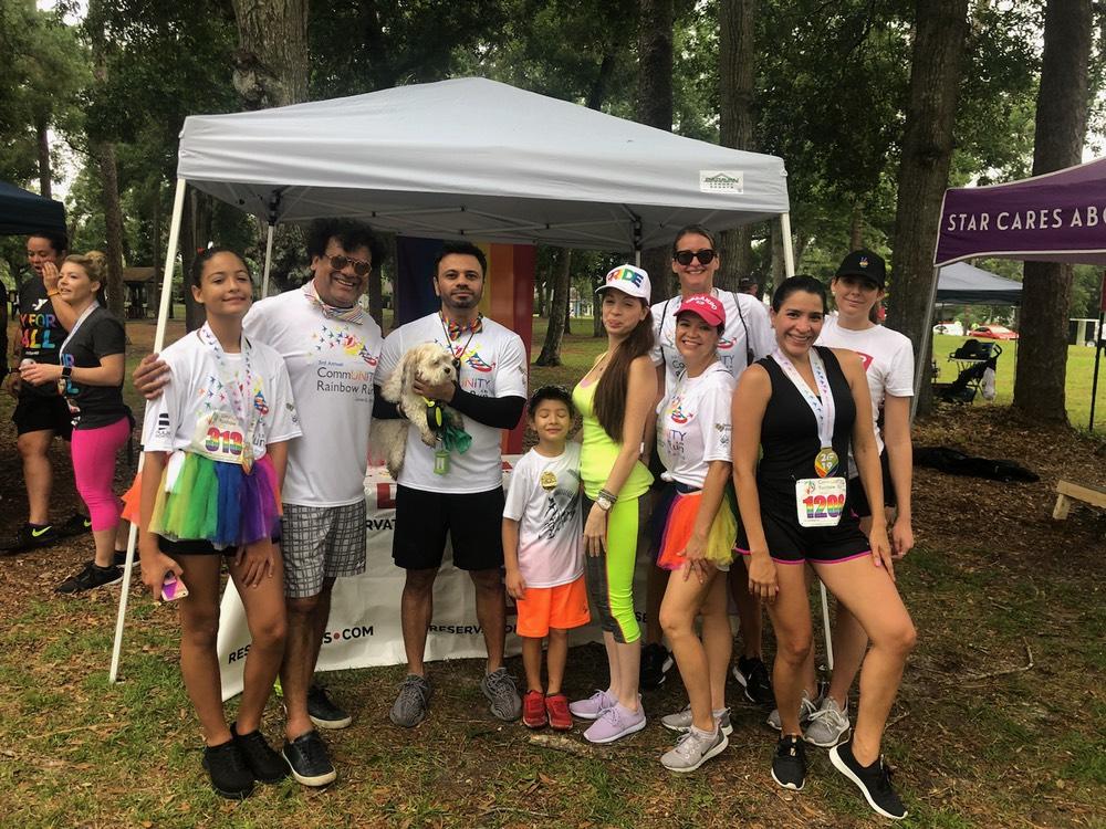 The Reservations.com team celebrating Pride in Orlando, FL. 