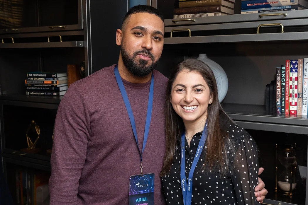 Members of the Acquis team enjoying each other's company at an event celebrating our recent office renovation.
