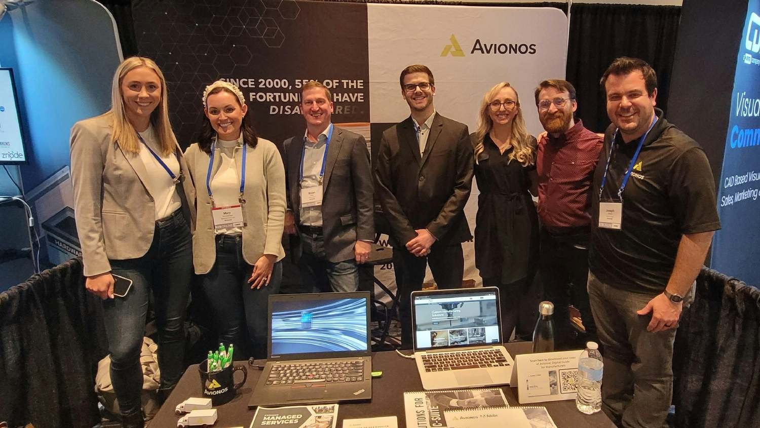 Members of our team proudly representing Avionos at a local conference.