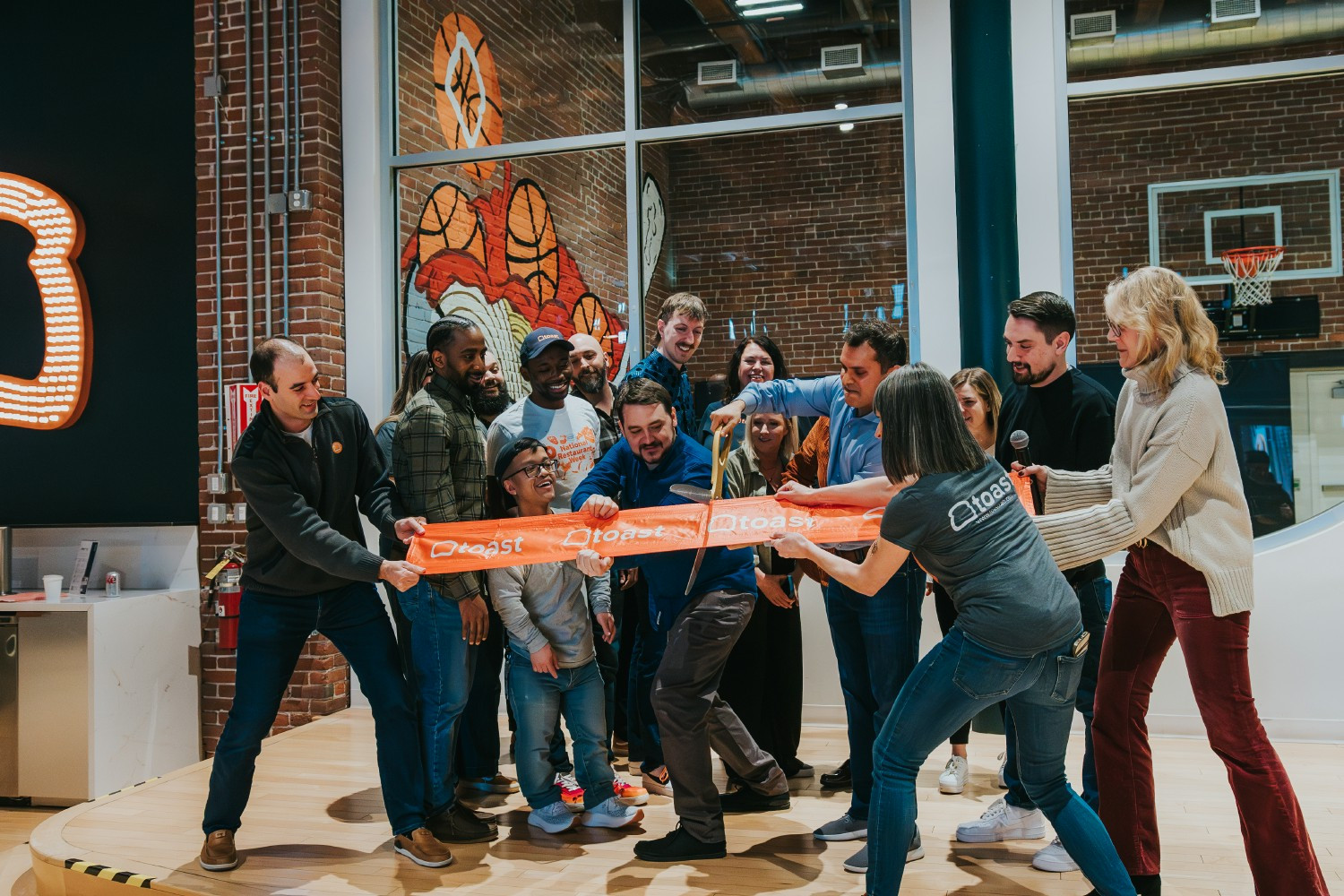 Leaders from across the business attended the ribbon cutting ceremony for our new Omaha office.