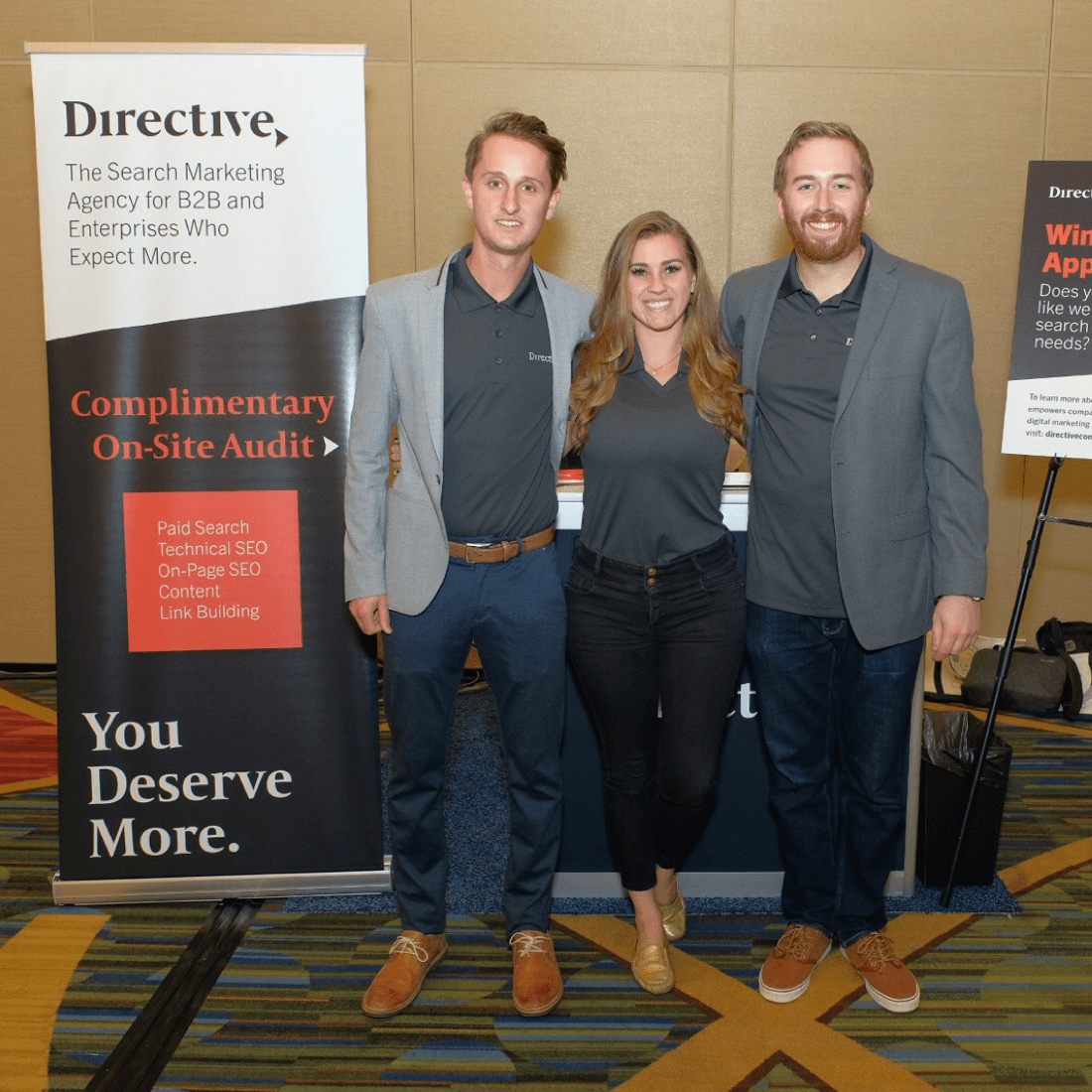 Members of Directive's growth team at their booth. 
