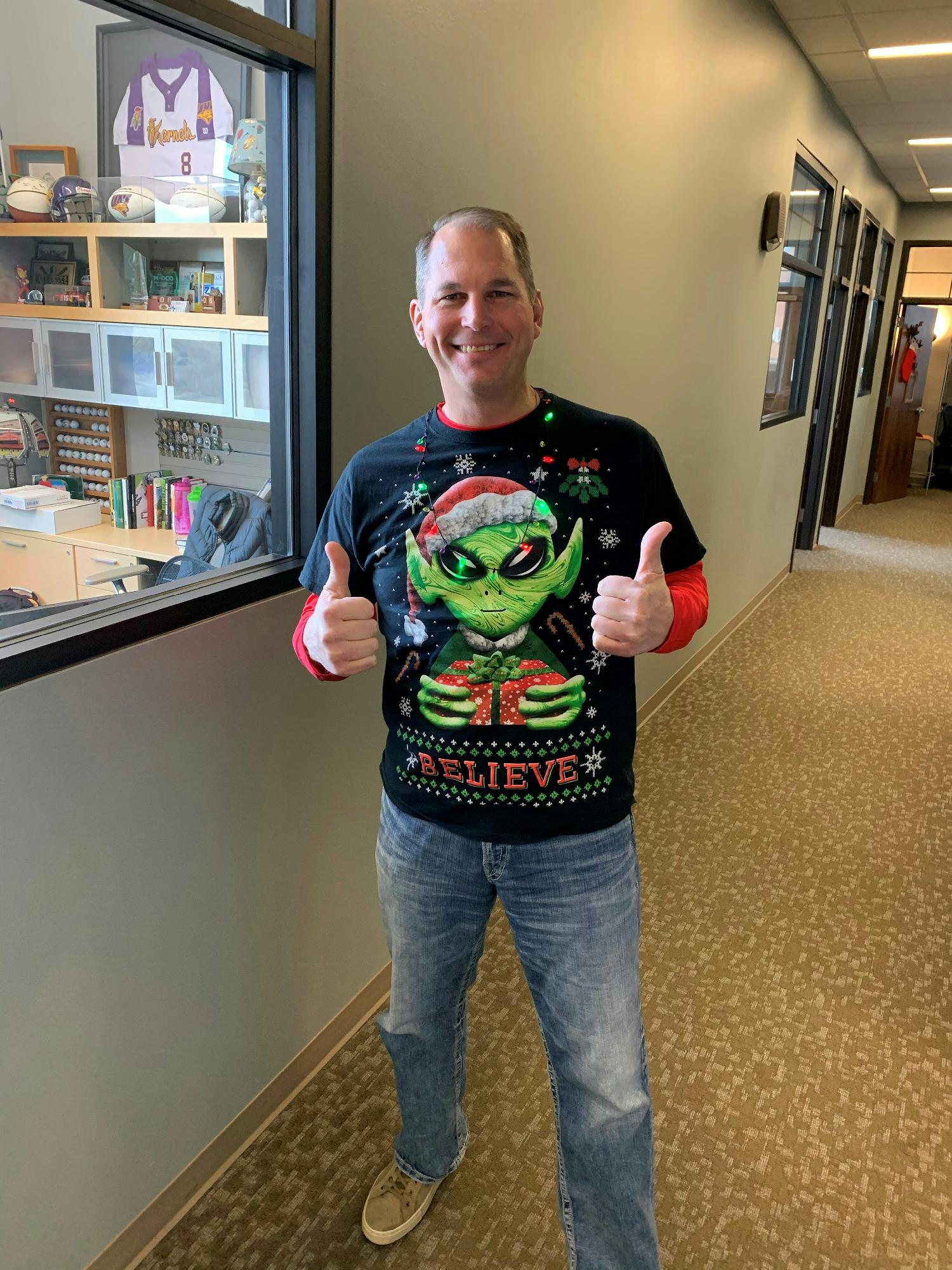 CEO, Ray Brown, sports his idea of an ugly Christmas sweater during our holiday celebration.
