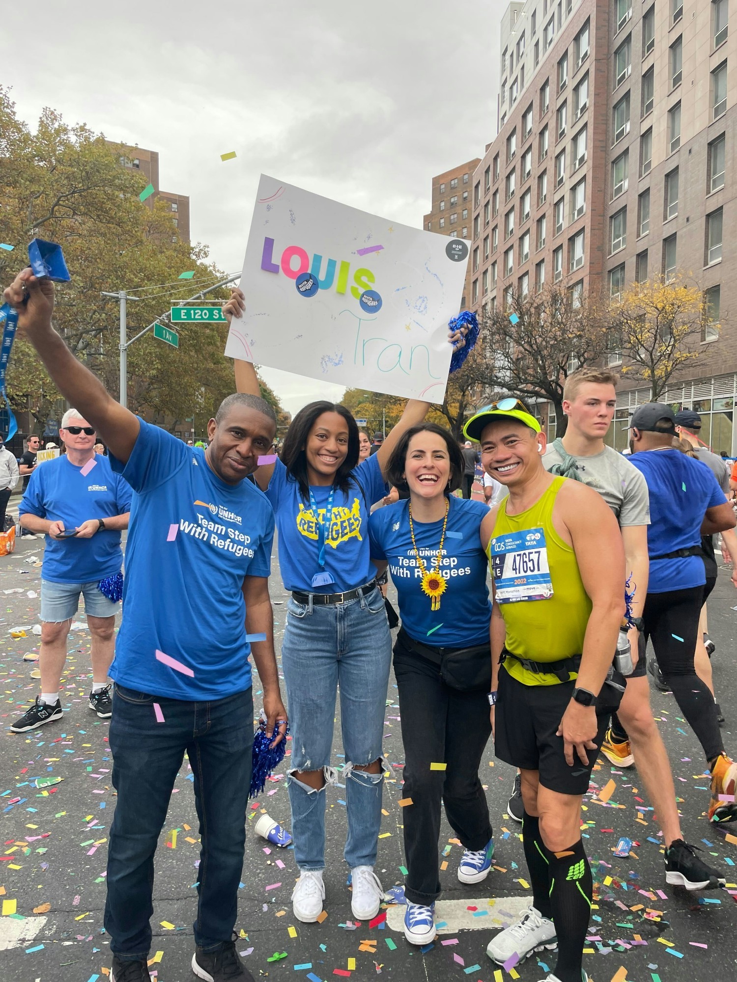Some of our team members at the NYC Marathon, with resettled refugee, Louis Tran.