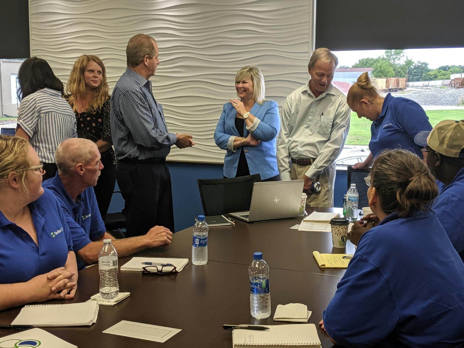 CEO enjoying lunch and visiting with our manufacturing staff in Iowa!