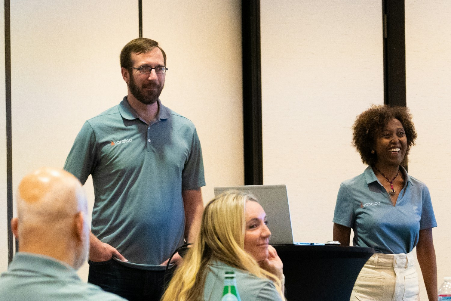 Team member presenting at annual company business event. 