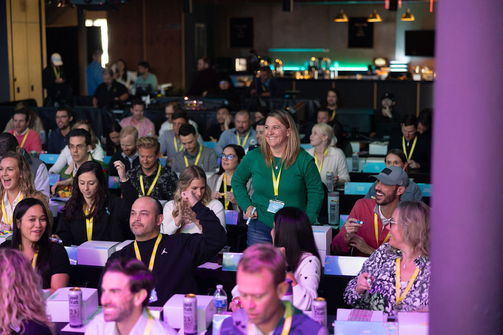 The leadership team enjoys a game of bingo during the 2024 Growth Summit.