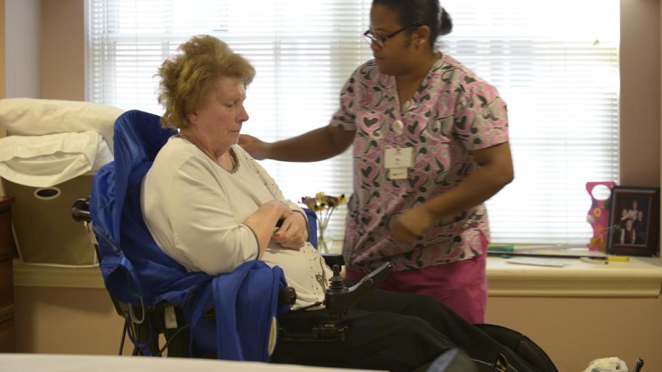 Staff member caring for a resident