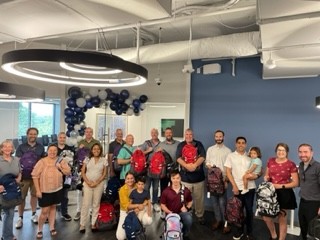 ShorePoint employees and families stuffed 150 backpacks for A Wider's Circle's back to school drive in June 2022.