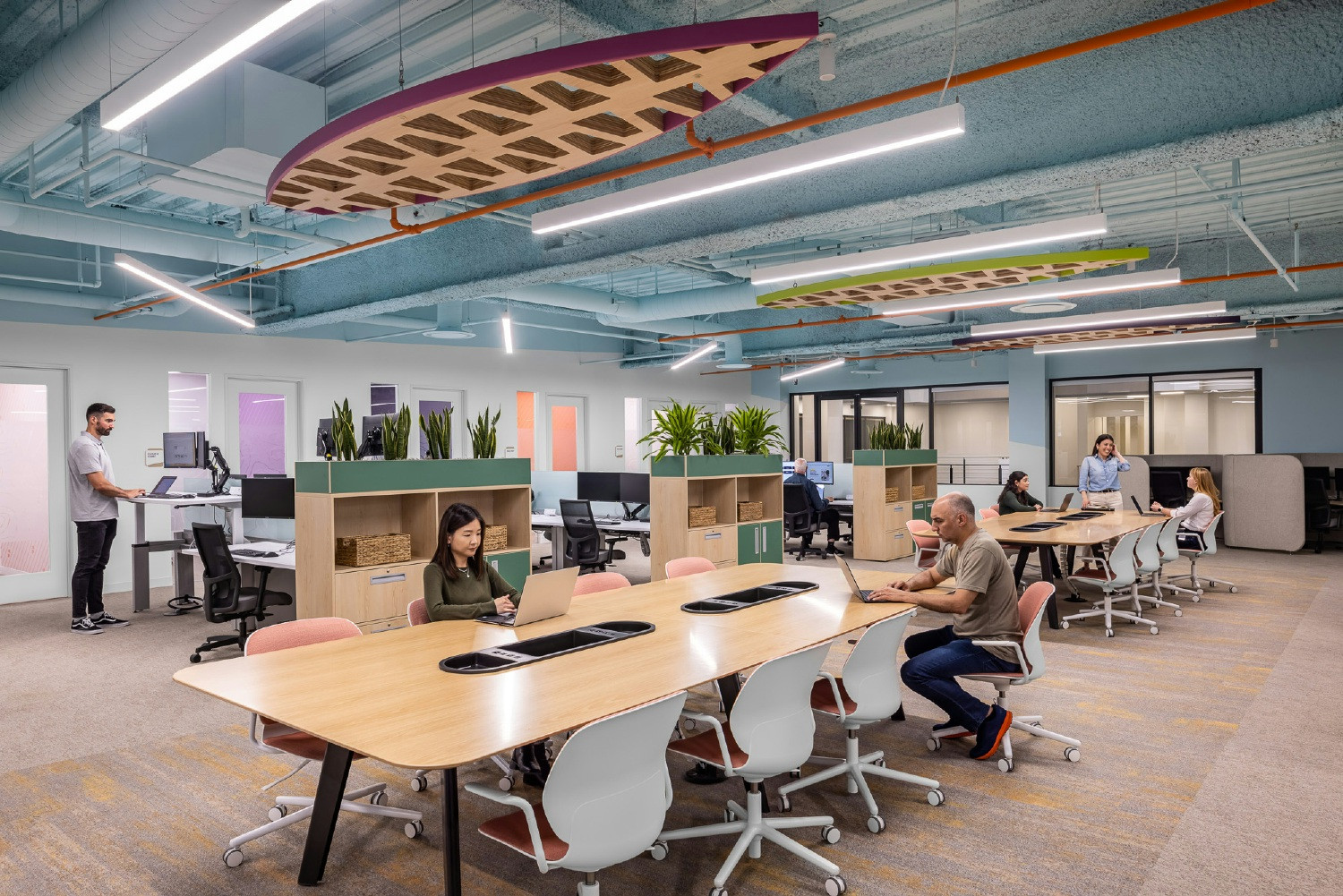 Seismic employees working in our San Diego office's library, a quiet place to work or take a break.