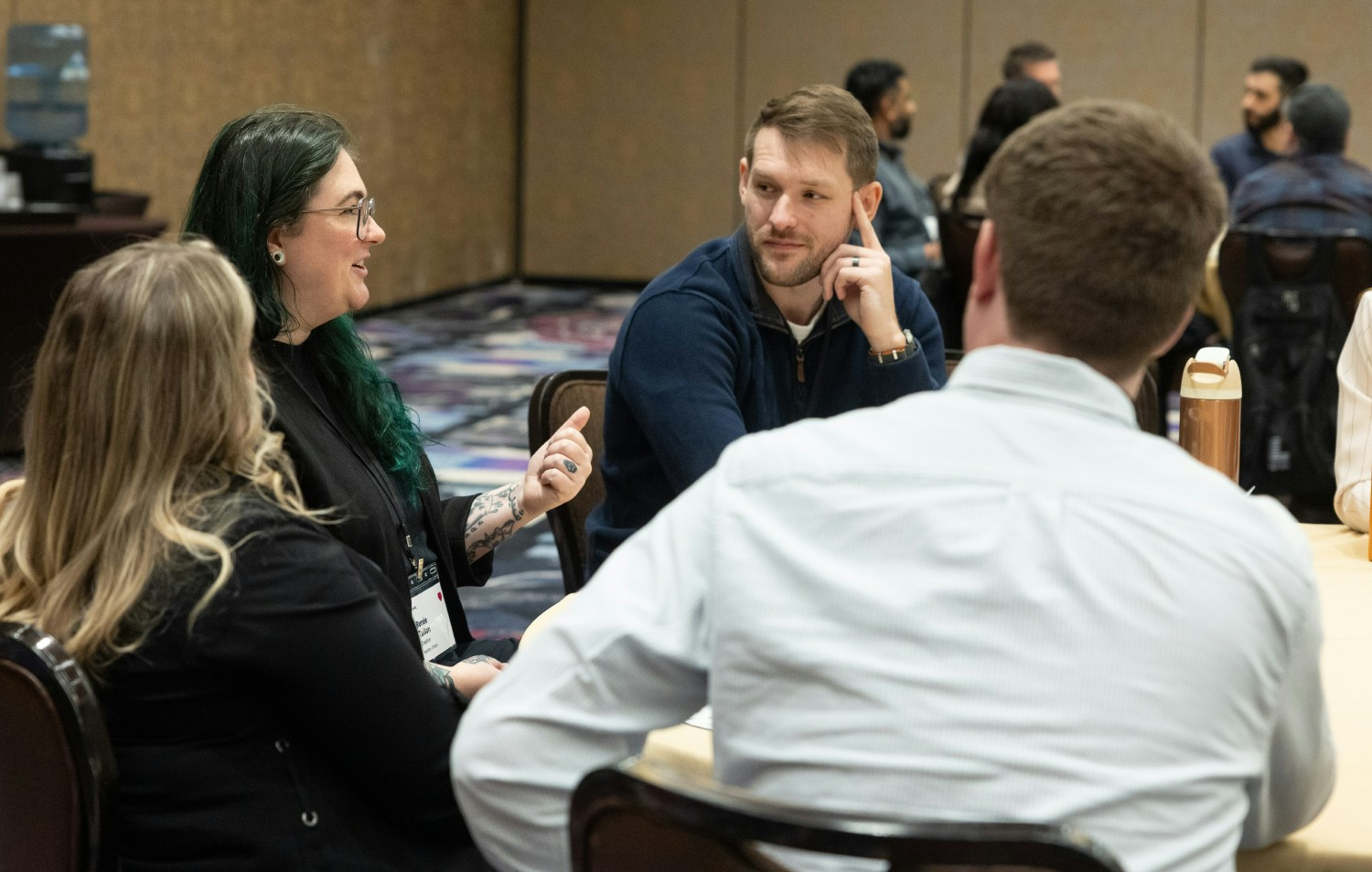 Employees sharing their responses during a group activity