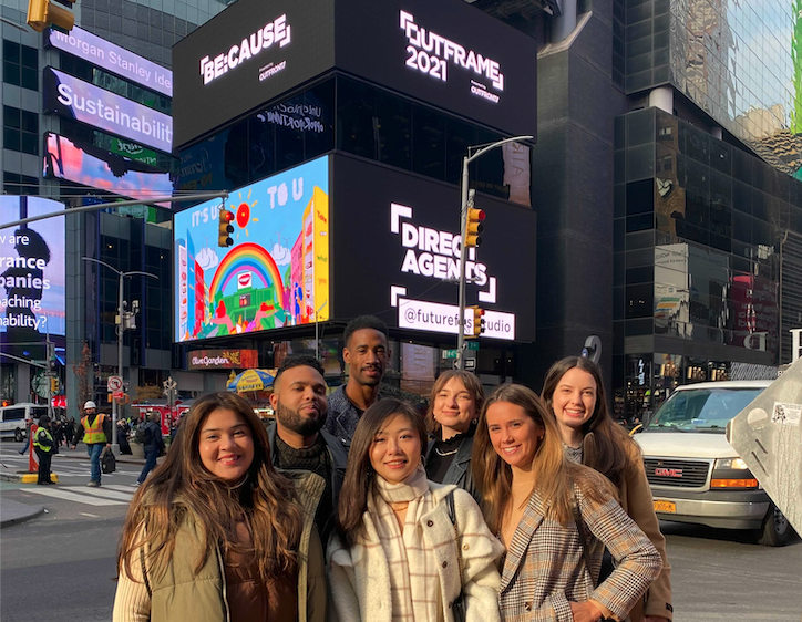 Creative team celebrates their art showcased in Times Square!