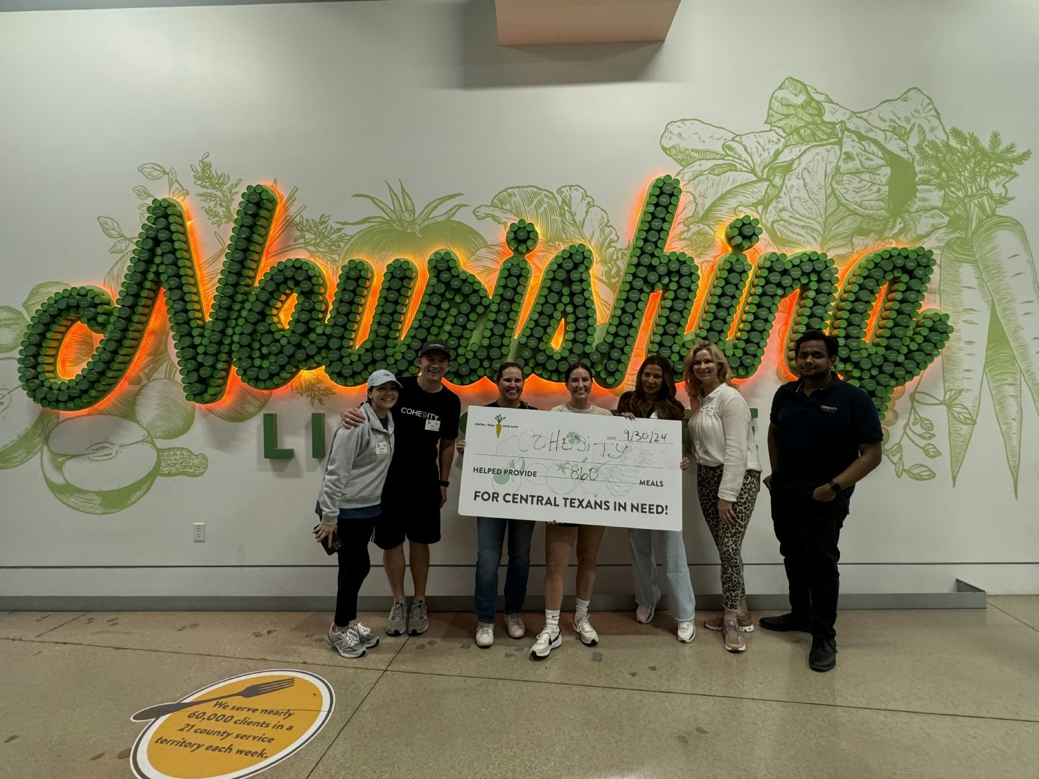 Employees based in Austin, TX, volunteering at a local food bank 
