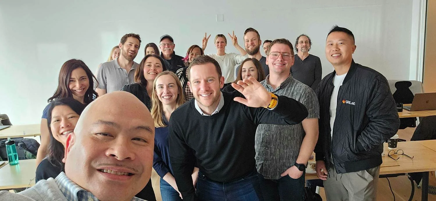 San Francisco, CA-based GitLab team members getting together to watch the virtual FY26 company kick-off