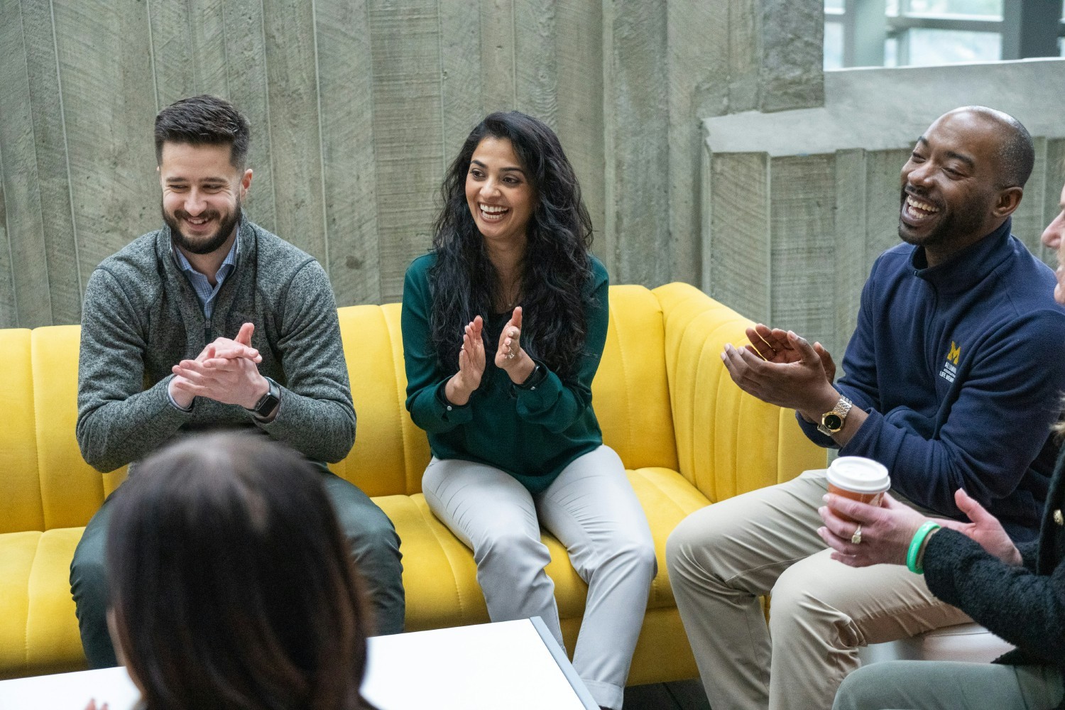 HashiCorp Employees having a team coffee chat. 