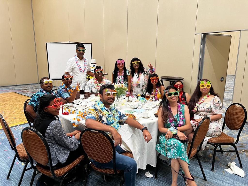 Dallas Team having fun with our CEO in Hawaiian Theme Party