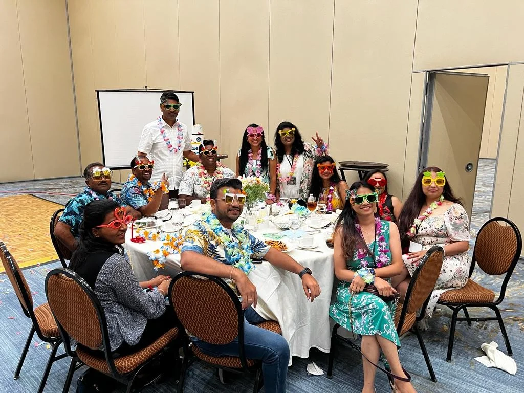 Dallas Team having fun with our CEO in Hawaiian Theme Party