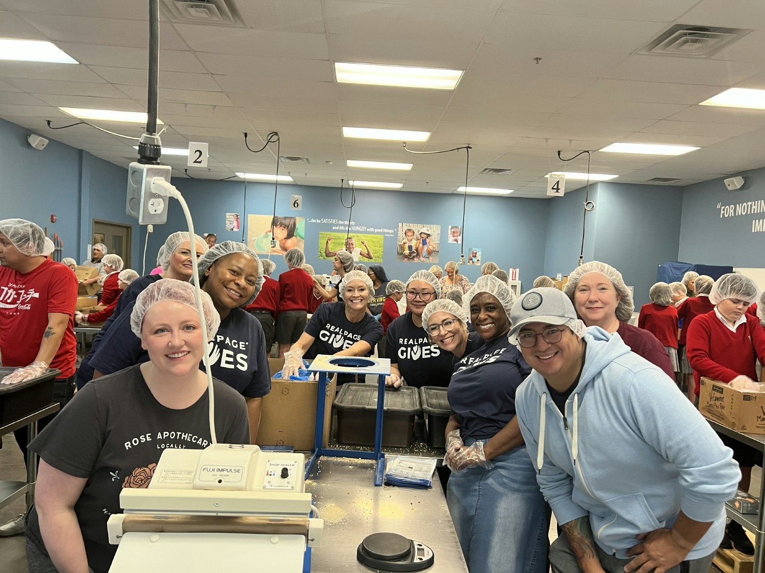 RealPage employees participating in the Feed My Starving Children campaign
