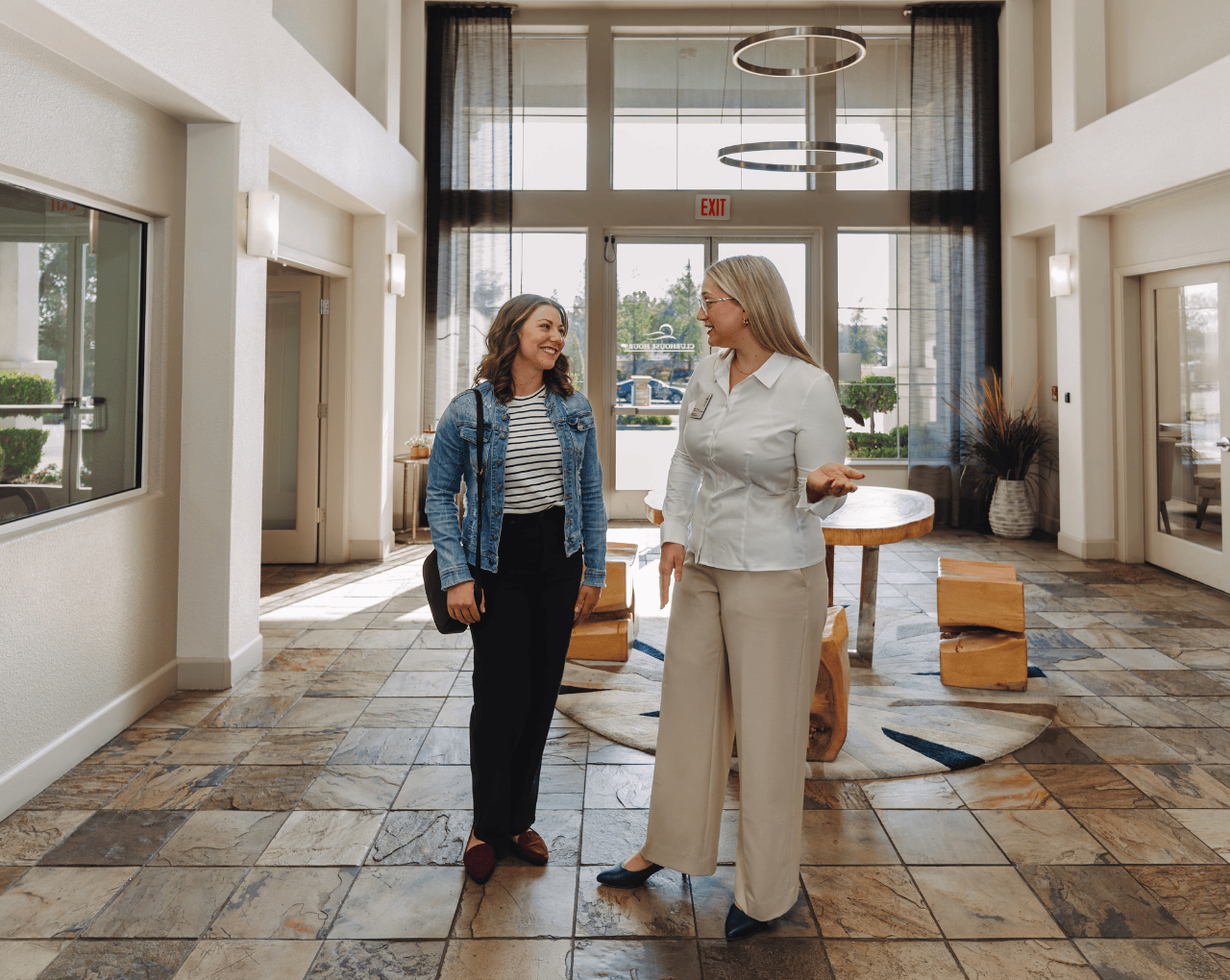 A leasing agent giving a tour of a Sequoia community
