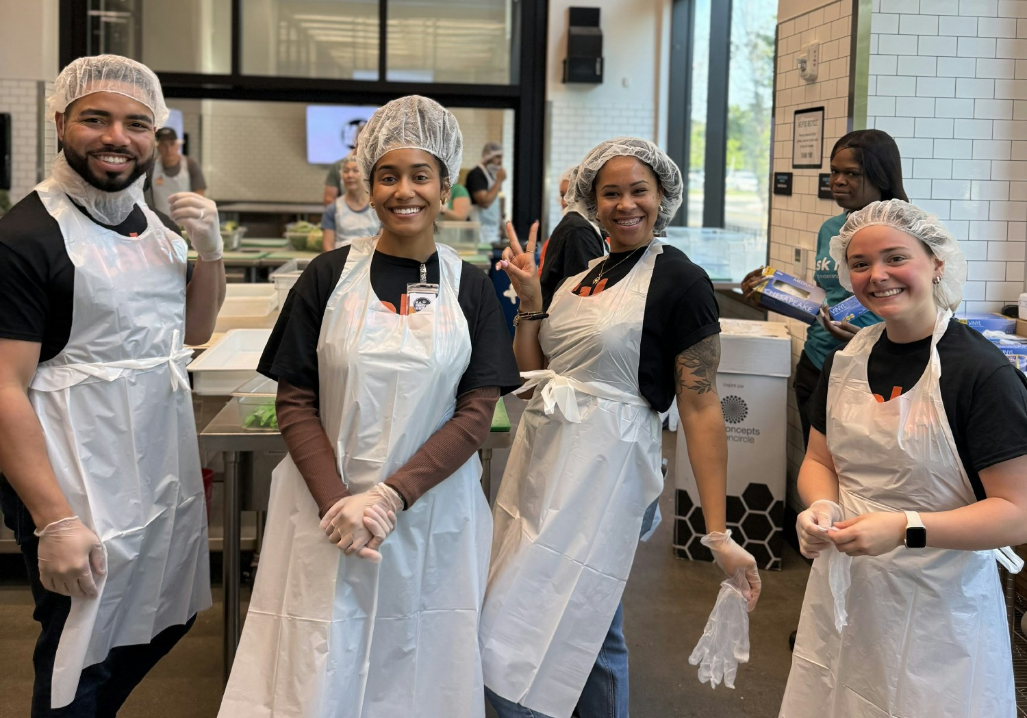 As part Take2 Cares, employees rolled up their sleeves at DC Central Kitchen to help prep meals for the community.