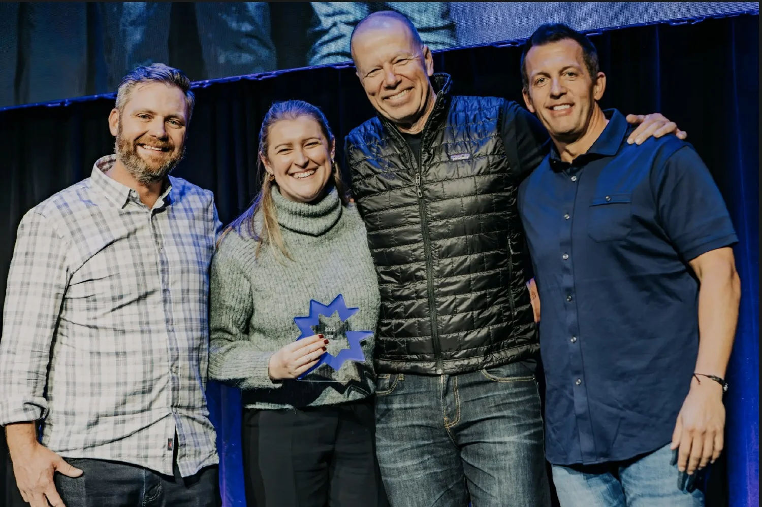 Co-Founder & CEO, Amit Bendov and CRO Shane Evans celebrate success by recognizing employee accomplishments.