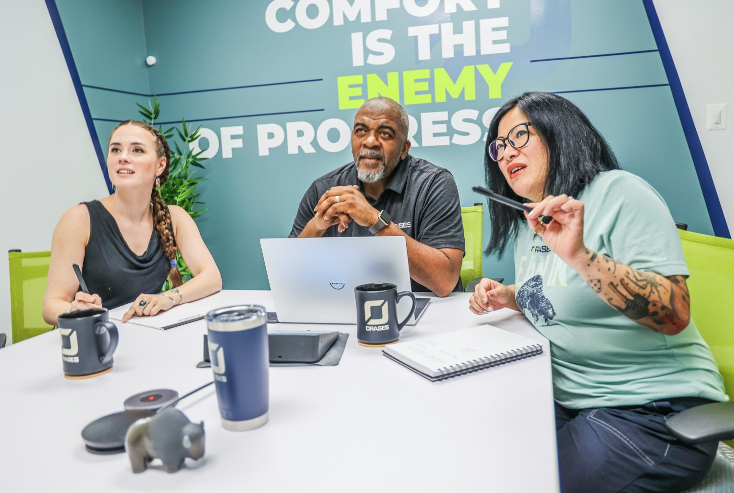 Orases Team Member walking by one of the company's 