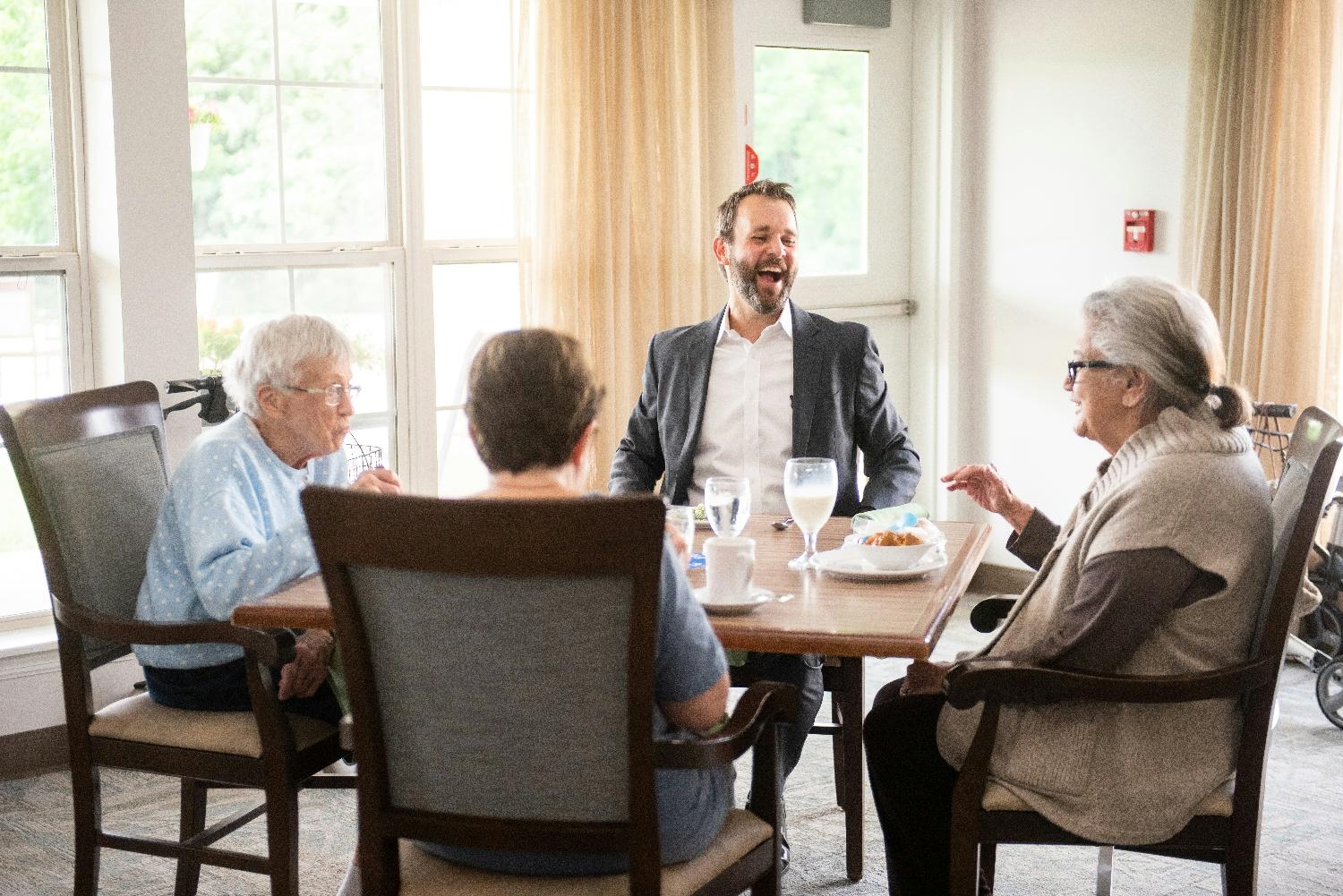 Dan Guill, Enlivant's CEO, having lunch with residents at Cherryvale Place in Rockford, IL