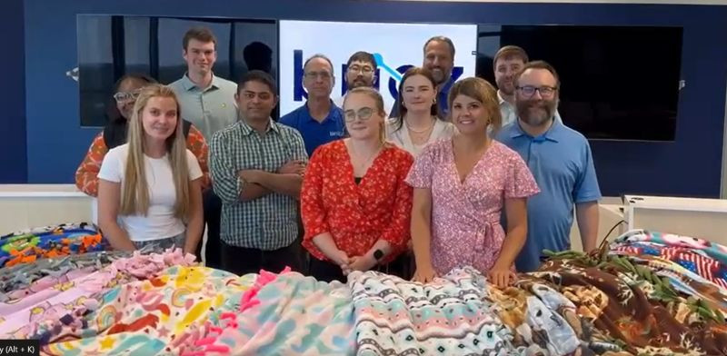 Volunteers at our blankets for charity company event at Bricz HQ in Atlanta