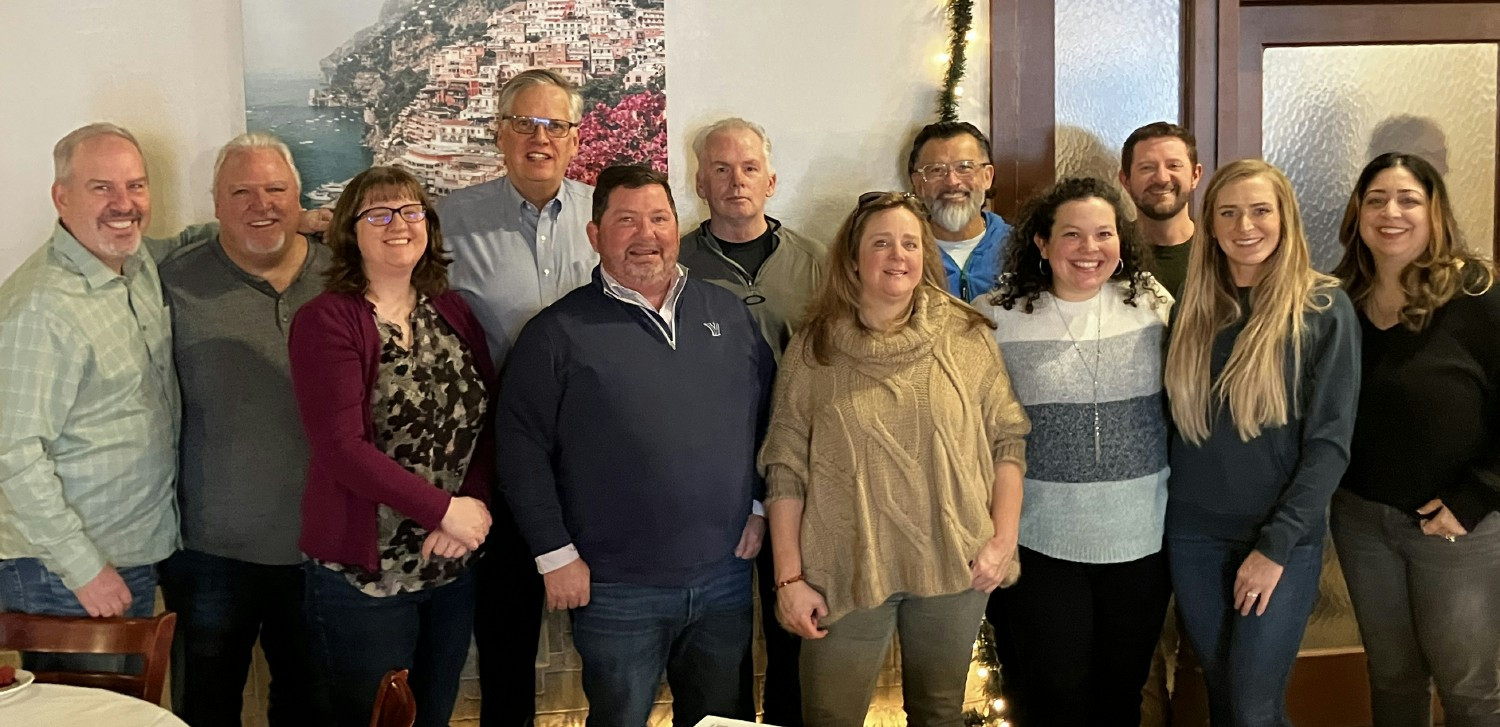 The GovCon365, powered by XTIVIA, team members gather to celebrate a retirement.