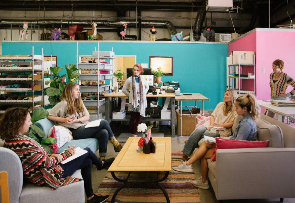 Warehouses don't have to be dull grey. In fact, colorful walls and a lighted menagerie can spark collaboration.