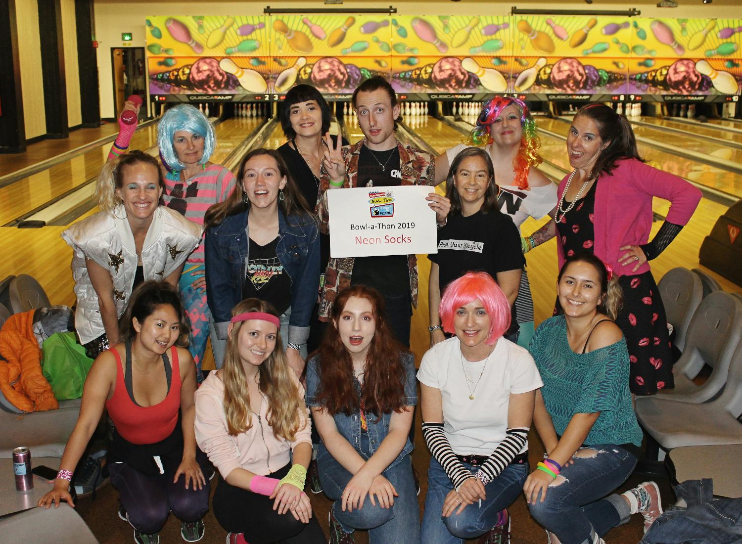 Giving back to our community, 80's style, supporting Transitions-Mental Health. We get to wear wigs??  Yes, please.