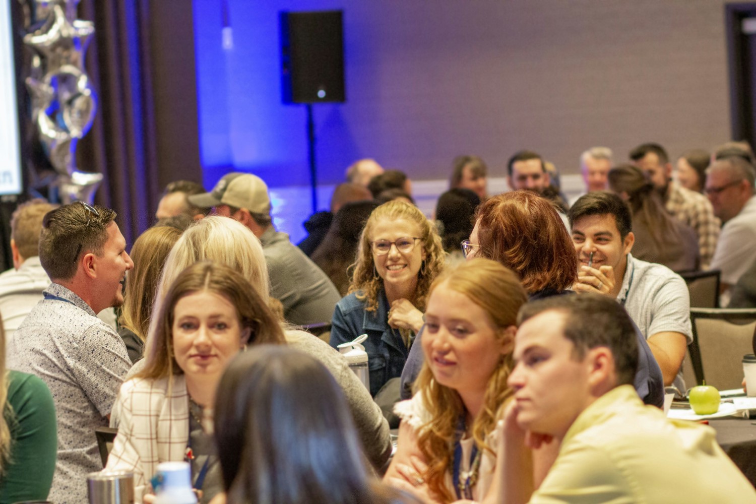 Principal Danette Amstein and Midan team members engage in icebreakers during our Annual Team Meeting. 