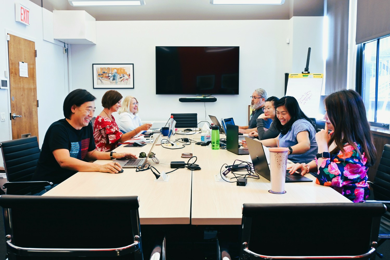 Teamwork makes the dream work! Our operations team discusses team logistics at one of our conference rooms in New York.