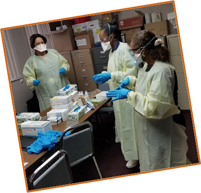 VNA Health Group employees gear up in full PPE to see patients during the pandemic.