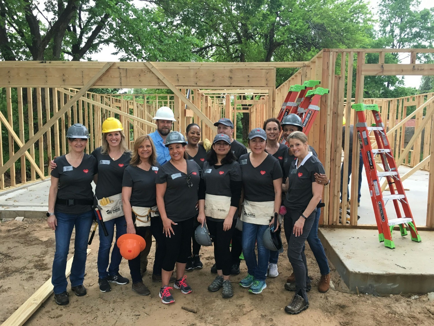 HALL Group volunteering with Habitat for Humanity through its We Care program