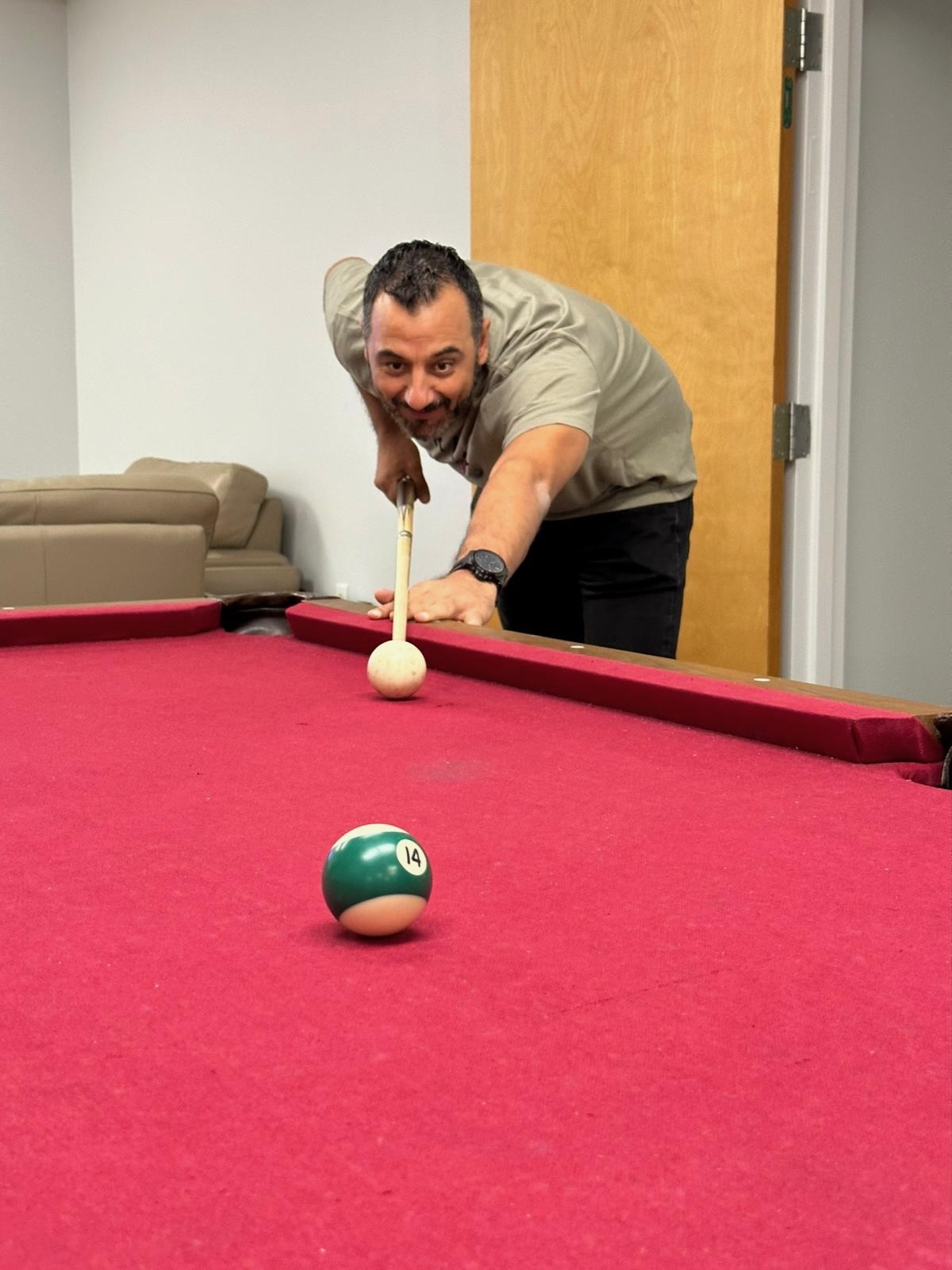 We have Pool table , and director of IT is playing with his team
