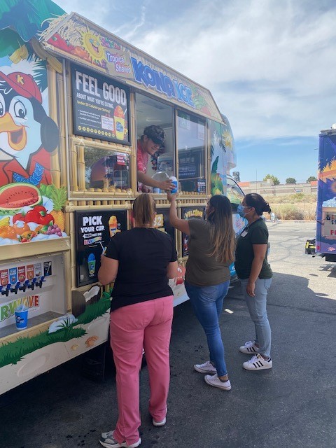 Our employees cooling off with the Kona Ice Truck