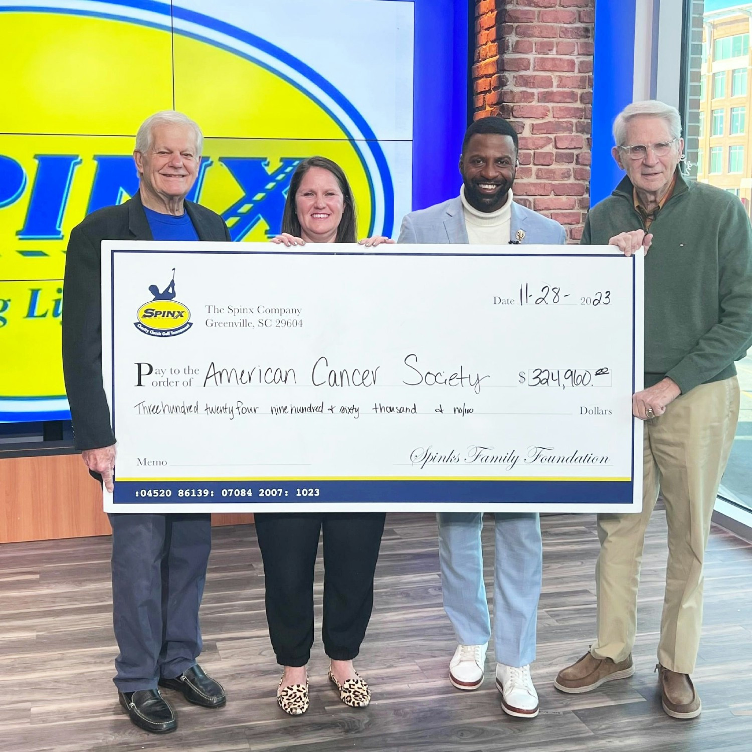 Spinx Founder Stewart Spinks was featured on local TV, presenting ACS with a sizable donation from Spinx stores.