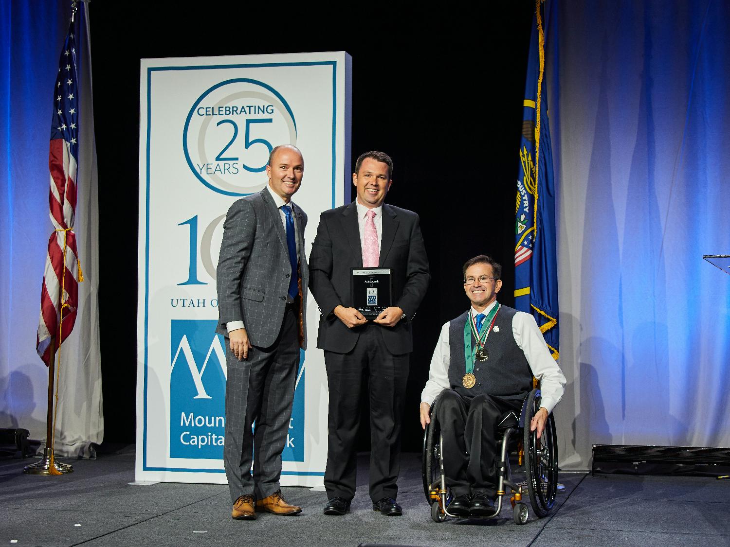 Acima President Rob Christiansen accepting an award for the Mountain West Capital Network's Annual Utah 100 Program. 