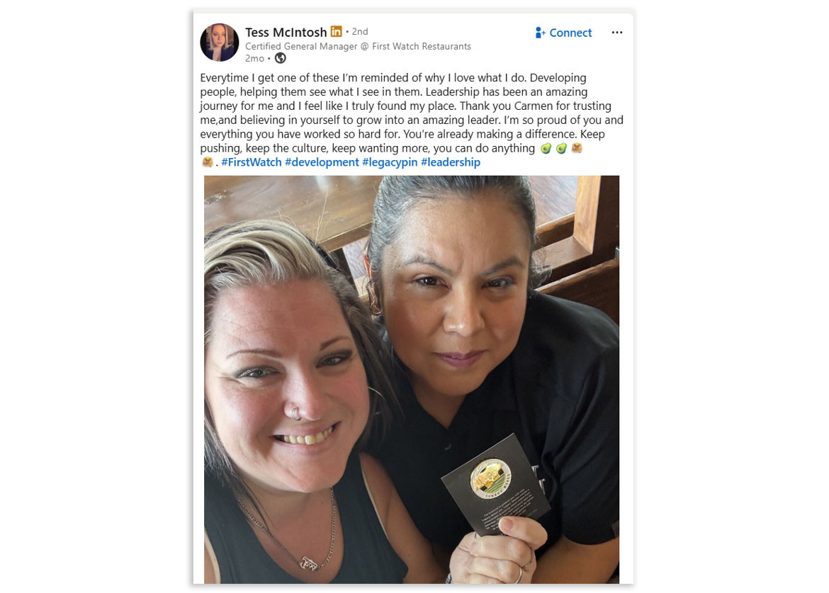 CGM Tess McIntosh receives a Legacy Pin from Black Hat (now Ops Manager) Carmen Bonilla for seeing her career potential