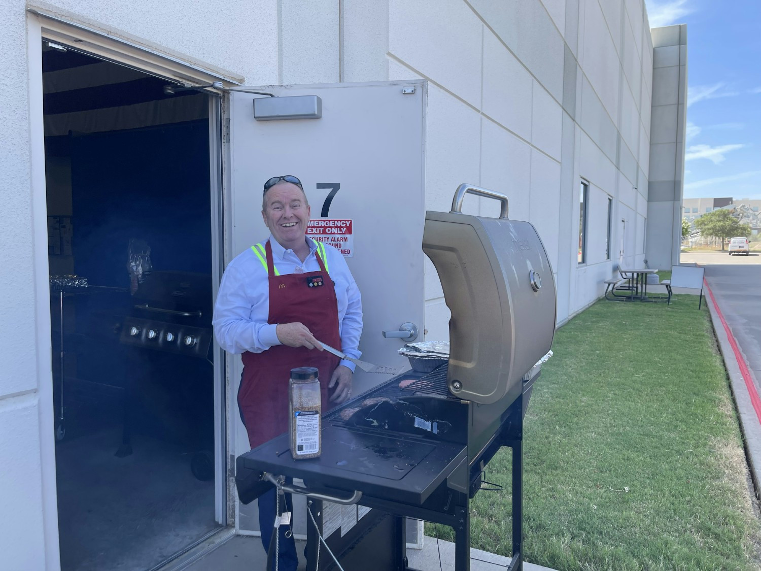 CEO cooking burgers and hotdogs for his team!