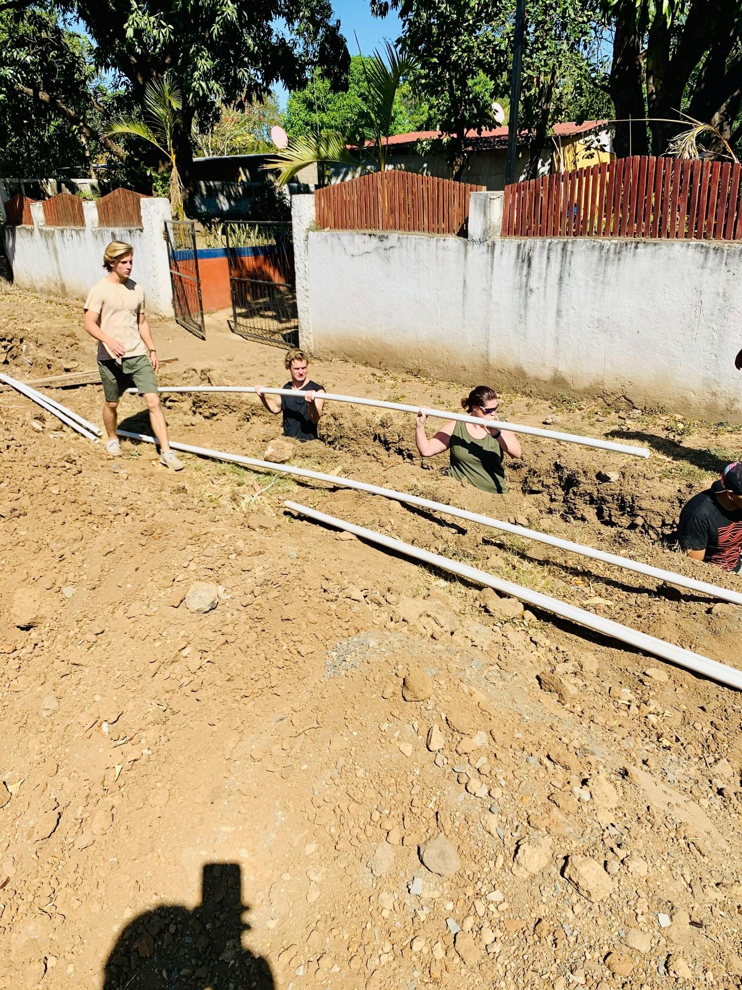 Installing distribution pipeline from another water well that will distribute water directly into 32 families' homes