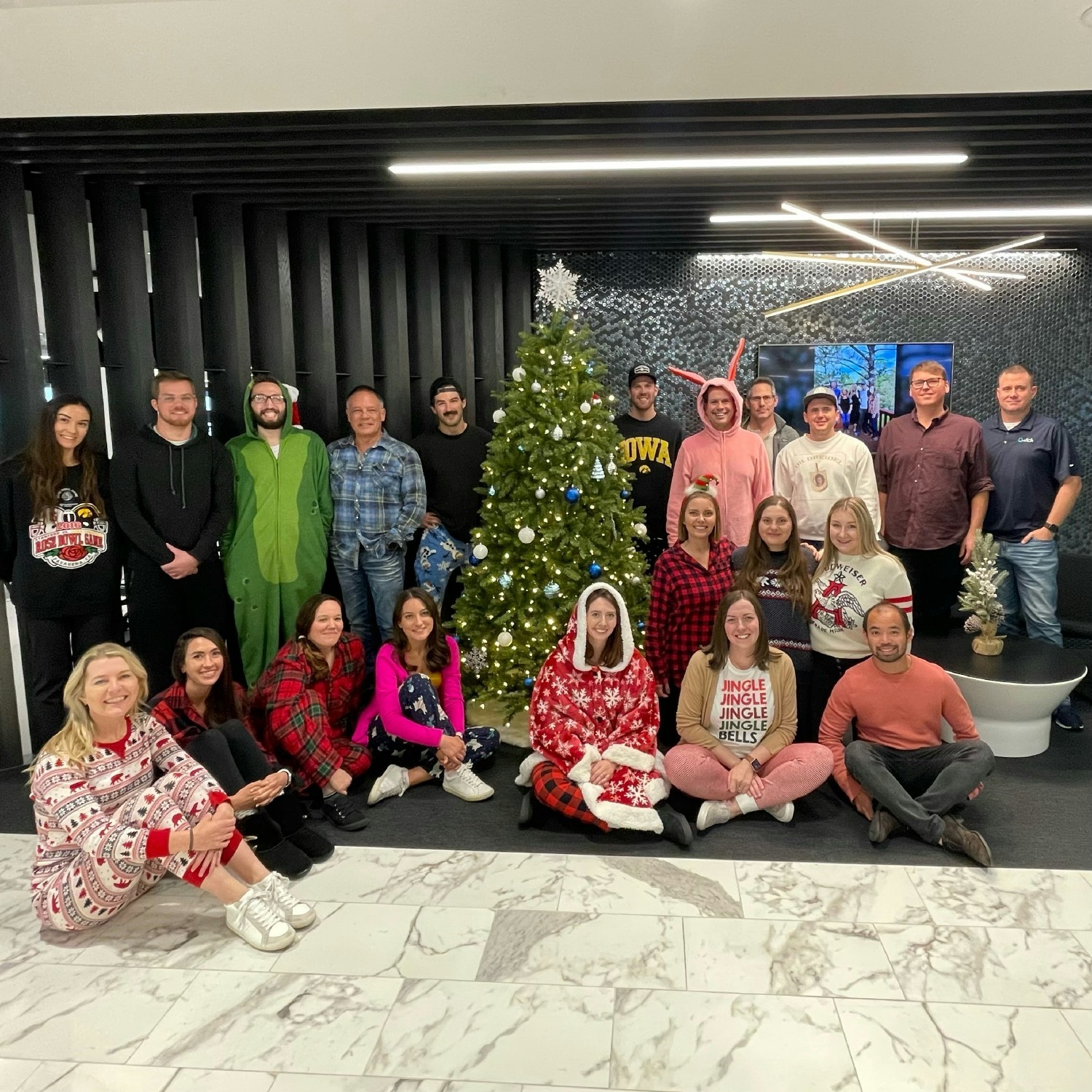 Qwick Team wearing holiday PJs