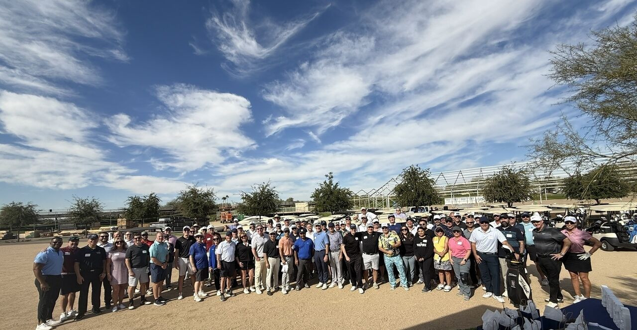Five9 employees at golf day with PGA Professional Max Homa