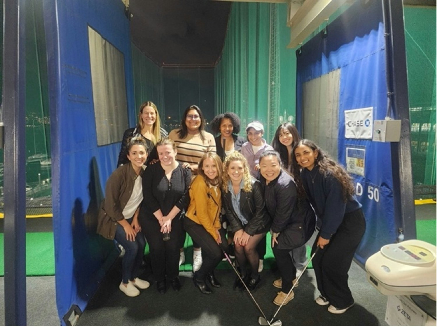 Our Women at Zeta ERG networking at Golf Outing in NYC.