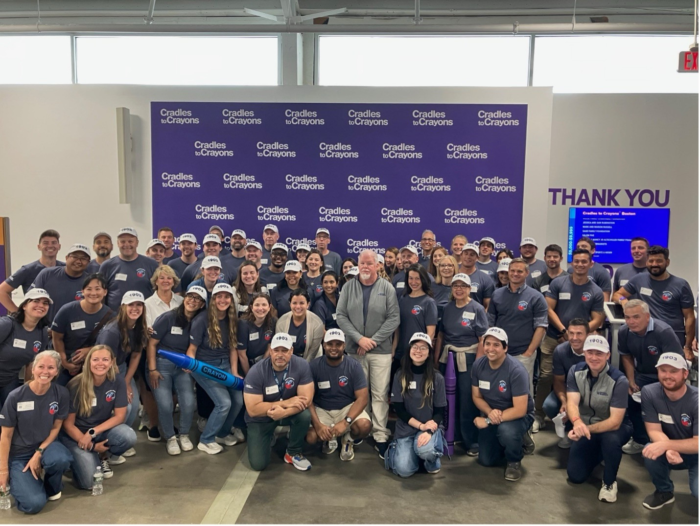 Boston employees sorted donated clothing for children in need with Cradles to Crayons for the annual Global Giveback.