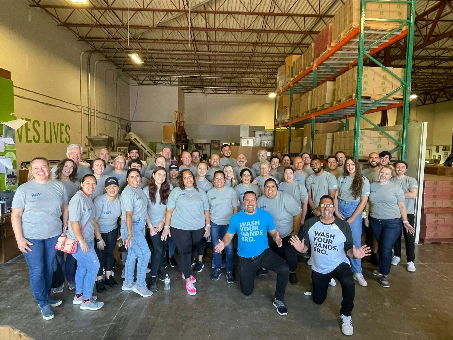 HGV team members volunteering with non-profit partner, Clean the World.