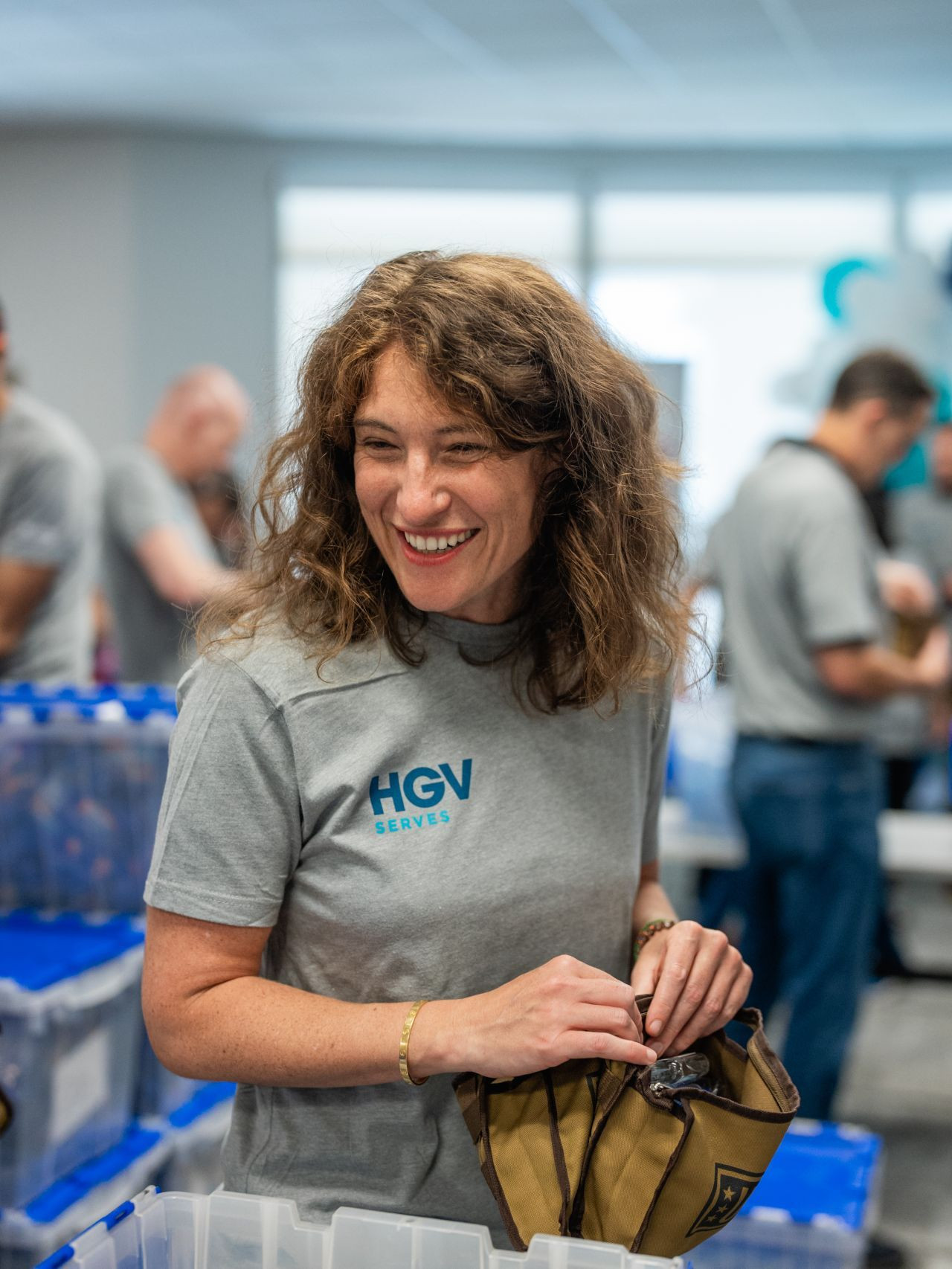 HGV team members volunteering with non-profit partner, United Service Organizations (USO).