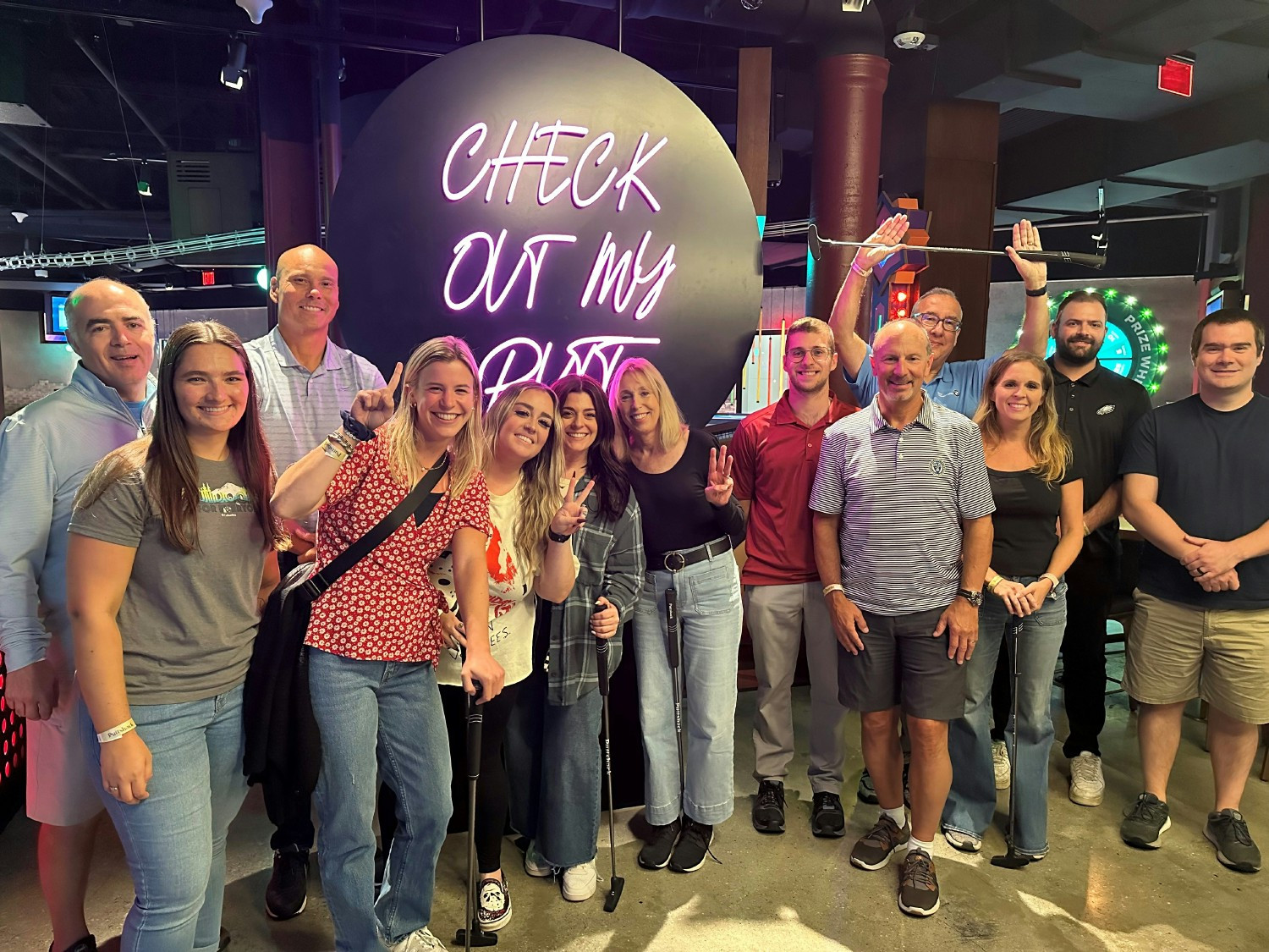 The Philadelphia office visits Puttshack indoor mini golfing for their summer team bonding activity. 