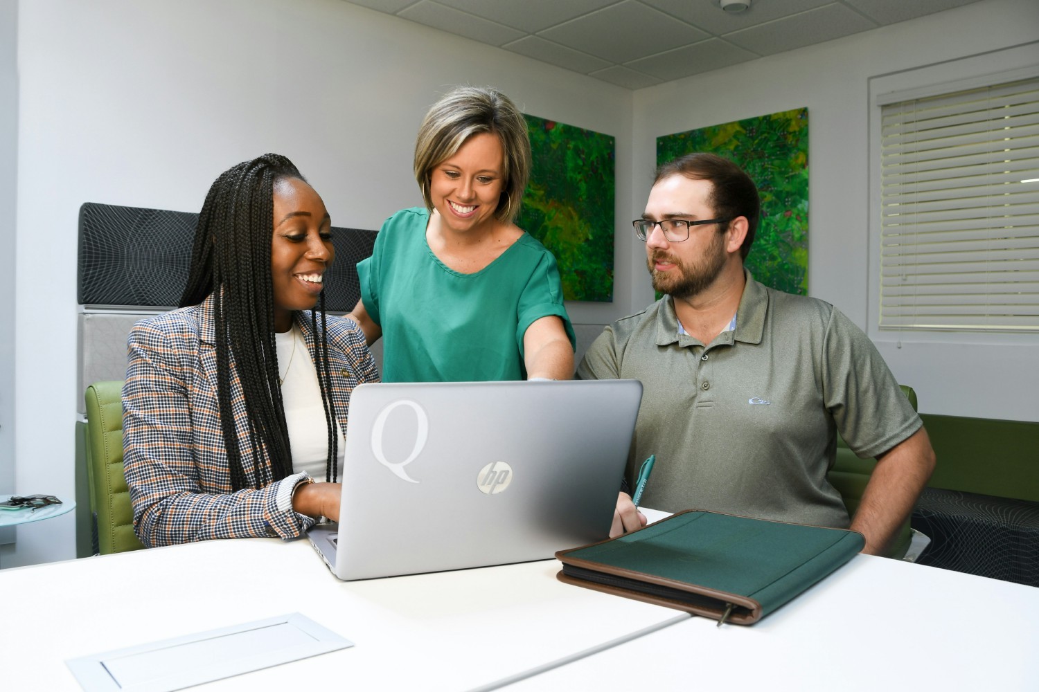 Queensborough employees collaborating in the Innovation Center