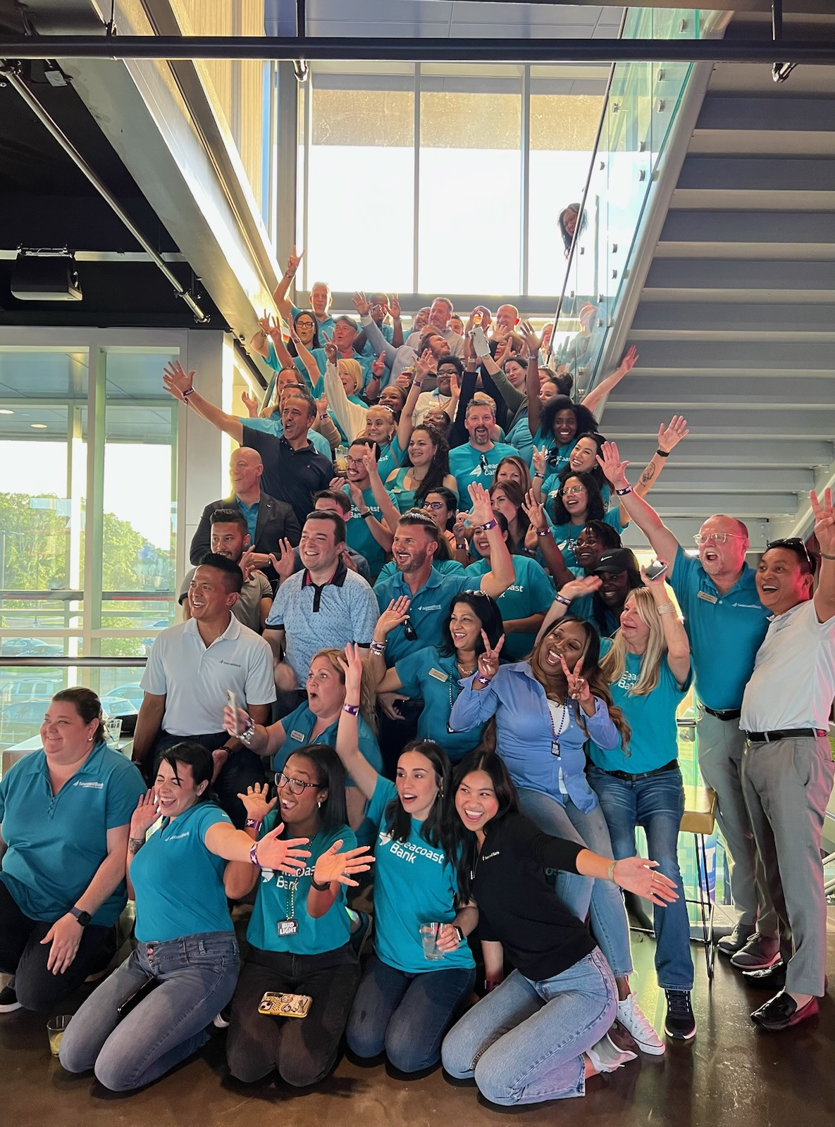 Associates having fun at a Top Golf outing.